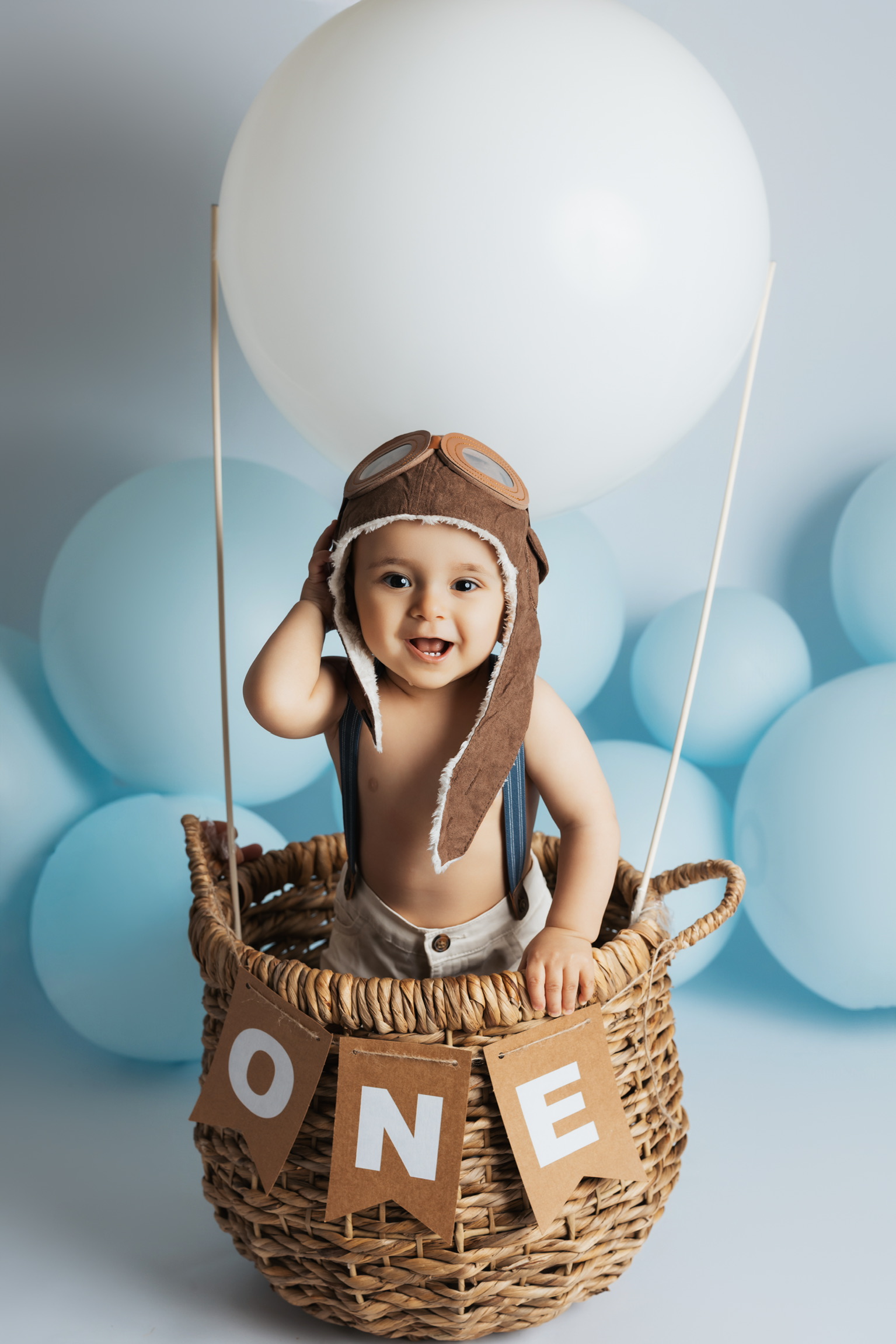 Cake smash birthday session - baby in hot air balloon basket, first birthday photography Appleton