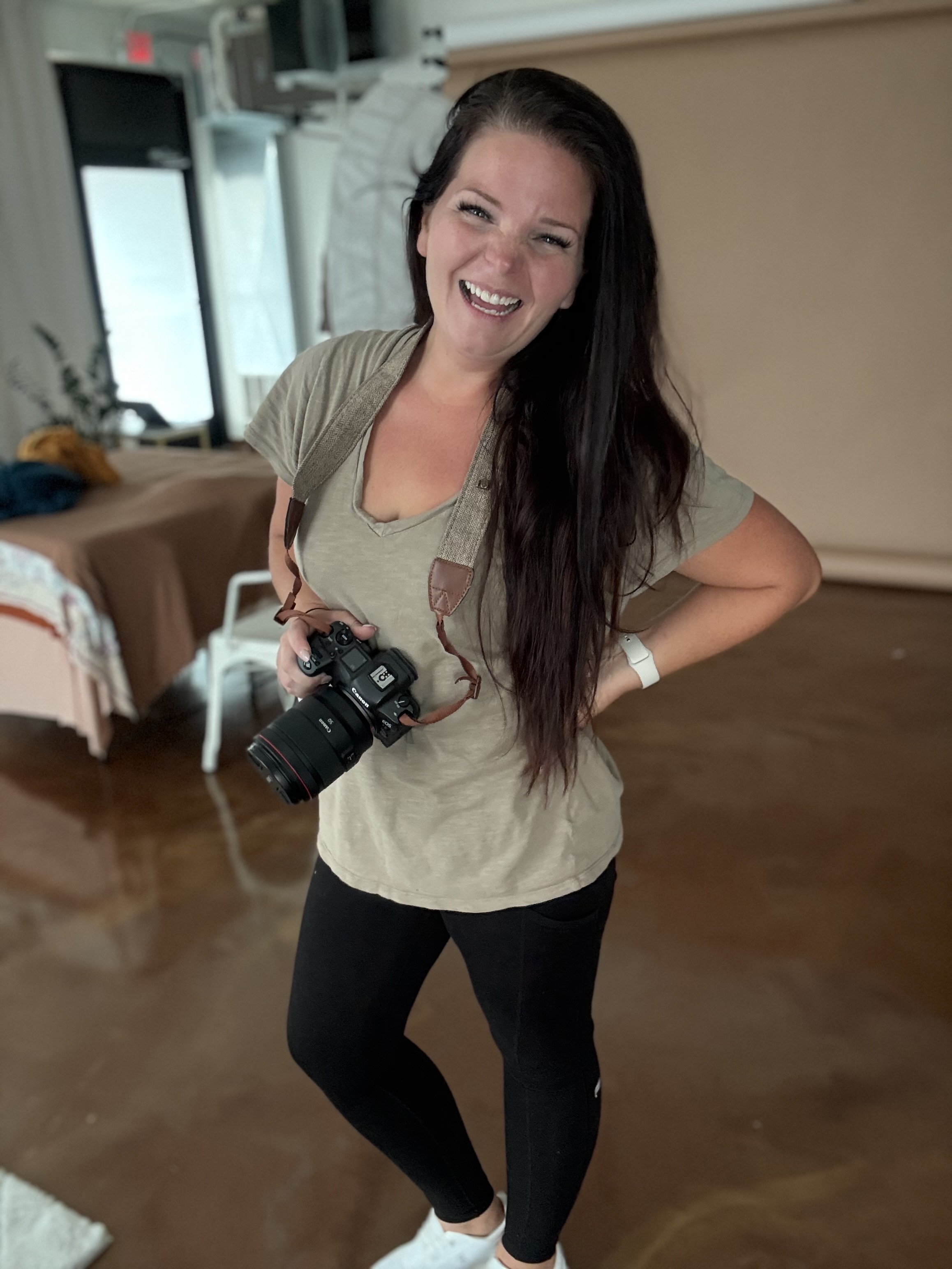 Karissa, photographer at Karissa Leigh Designs, laughing with camera