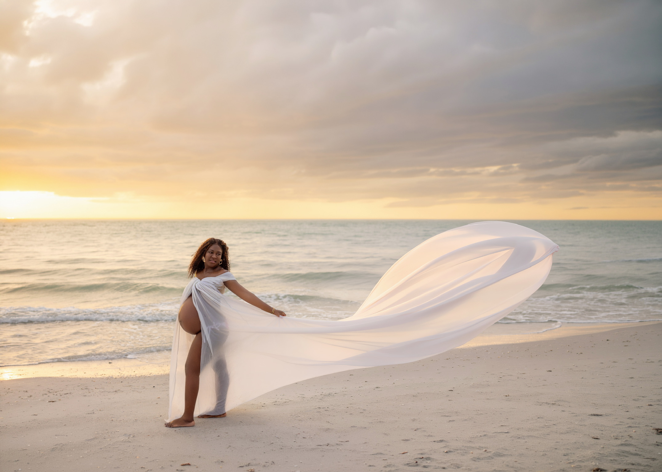 Tampa beach maternity photography golden hour Gulf Coast
