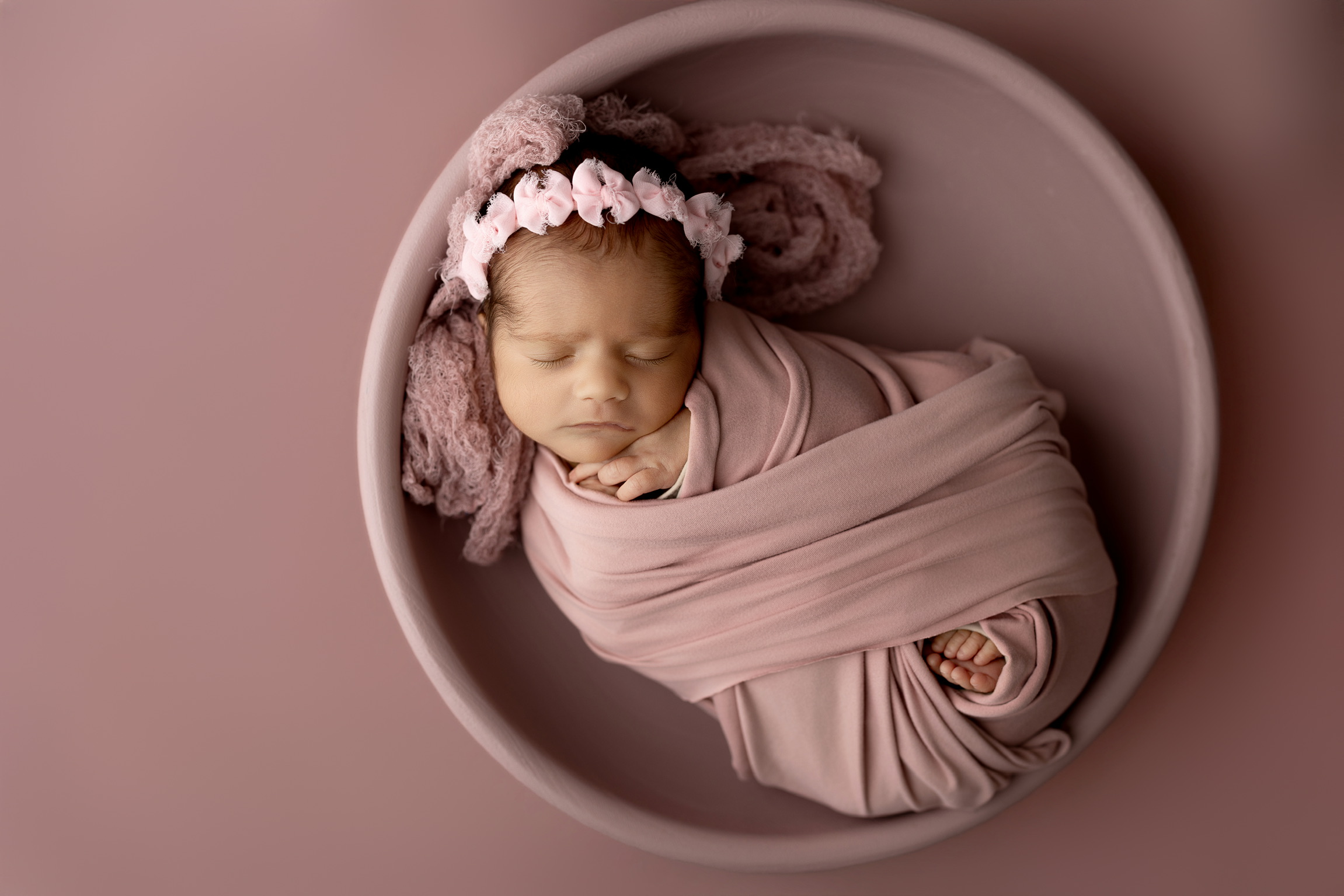 Newborn photography Tampa - baby girl in dusty rose wrap, round bowl, overhead portrait